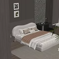 Modern Bedroom Interior With White Bed Wooden Headboard Rug And Decorative Paintings