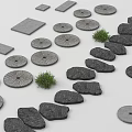 Garden Stepping Stones With Circular And Irregular Shaped Stone Slabs And Small Green Plants