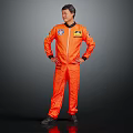 Man in orange spacesuit standing with hands on hips against dark background with NASA logo