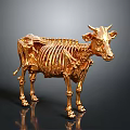 Artistic Golden Cow Skeleton Sculpture with Intricate Bone Design and Metallic Shine