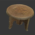 Handcrafted Red Wooden Stool With Round Top Intricate Carved Pattern And Three Legs