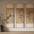Three Traditional Chinese Scroll Paintings Hanging With Bamboo Plant In Interior