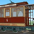 Red and Beige Tram Number 6 with White Curtains Green Undercarriage on Rail Tracks Jena
