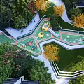 Aerial View of Children's Playground With Green Turf Yellow Structures and Curved Paths