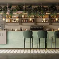 Cafe Interior With Warm Lighting Hanging Plants Green Bar Stools And Shelves With Jars