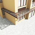 Modern Glass Canopy Structure Installed Above Windows On Yellow Building Exterior