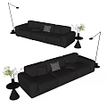 Black Leather Sectional Sofa With Decorative Pillows Side Table Plants And Floor Lamp