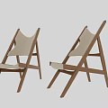 Two Modern Lounge Chairs With Wooden Frame And Light Colored Cushion