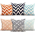 Decorative Throw Pillows with Chevron and Interlaced Patterns in Orange Blue and White Tones 3d model