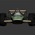Vintage Green Single Seater Racing Car With Large Wheels And Rear Wing