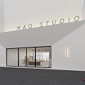 MAO STUDIO Modern Storefront Facade With White Building Glass Doors Brick Wall And People Walking