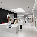 Modern Bright Clothing Store Interior With Mannequins Hanging Clothes And Large Screen