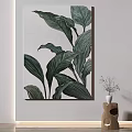 Plant Painting with Large Green Leaves on White Wall and Small Vase in Natural Decor