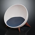 Modern Round Chair Design With White Frame Blue Cushion And Brown Tapered Legs