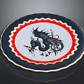 Decorative Plate With Blue Wavy Rim Red Border White Background And Black Dragon Design