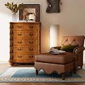 Ornate Wooden Chest of Drawers With Leather Chair Ottoman And Wall Art In Living Room