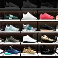 Stylish Casual Shoes Display With Various Colors And Trendy Designs On Shelves