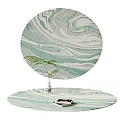 Round Rug Featuring Green and White Marbled Design with Small Fern and Tablet