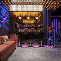 Stylish Bar Interior With Colorful Lighting High Tables And Comfortable Chairs