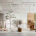 Stylish Modern Clothing Store Interior With Hanging Clothes Racks And Green Plants