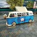 Blue KHOPPS Commercial Food Truck With Outdoor Wicker Seating In Mall Courtyard