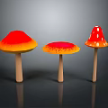 Three Colorful Vibrant Mushrooms with Orange Red Gradient Spotted Caps and Wooden Stems