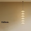 Poliform Modern Layered Pendant Light With Geometric Shades On Neutral Wall