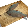 Two Fresh Fish With Red Fins And Silver Scales On Wooden Cutting Board