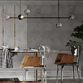 Modern Dining Table Set With Transparent Brown Chairs Glass Ball Pendant Lights Gray Striped Wall