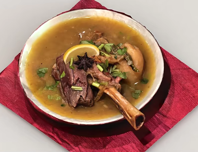 Nourishing Meat Soup with Bone Lemon Slice Star Anise and Coriander on Red Napkin 3d model