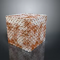 Red And White Interlaced Pattern Cube With Shiny Reflective Surface