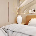 Modern Bedroom With Abstract Light Wave Texture Wall Beige Headboard White Vase Branches Photo Frames