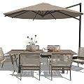 Stylish Outdoor Table with Woven Chairs Large Umbrella Decorative Vase and Fresh Fruits