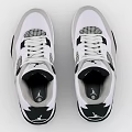 White and Black Jordan Sneakers with Gray Accents and Mesh Detailing