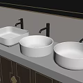 Three White Ceramic Bathroom Sinks With Black Faucets On Black Countertop And Dark Cabinets