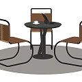 Modern Dining Table Set With Round Black Tabletop And Brown Woven Chairs 3d model