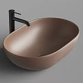 Modern Cream Colored Oval Countertop Wash Basin With Black Faucet Design