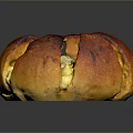 Freshly Baked Round Artisan Bread With Golden Crust And Cheese Filling