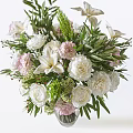 Elegant Floral Arrangement In Clear Glass Vase With White Roses Pink Blooms And Green Foliage