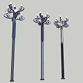 Three Outdoor Street Lamps With Ornate Multi Head Design And Elegant Poles