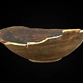Ancient Pottery Bowl With Chipped Edges And Black Brown Textured Surface