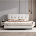 Elegant Modern Double Bed With White Leather Upholstered Headboard Brown Pillows And Beige Blanket