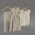 Children's Light Colored Clothing Set With Dress Vest And Ruffled Details On Hangers