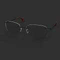 Sleek Metal Frame Eyeglasses With Red Temple Arms On Black Background