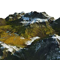 Breathtaking Mountain Landscape With Snow Capped Peaks Green Slopes And Golden Valley