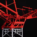 Red And White Industrial Tower Crane With Tall Structure Long Jib Black Background