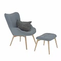 Blue Leisure Chairs With Gray Decorative Pillows And Light Wooden Legs And Ottoman