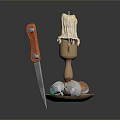 Candle Holder With Melted Candle Colored Gems Skull And Orange Handle Knife
