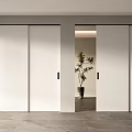 Modern White Sliding Doors With Black Frames Open And Closed Near Grey Floor And Plant