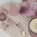 Pink Perfume Cosmetics On Tray Featuring Laser Cut Candle Jar Roller Tools And Lavande Box